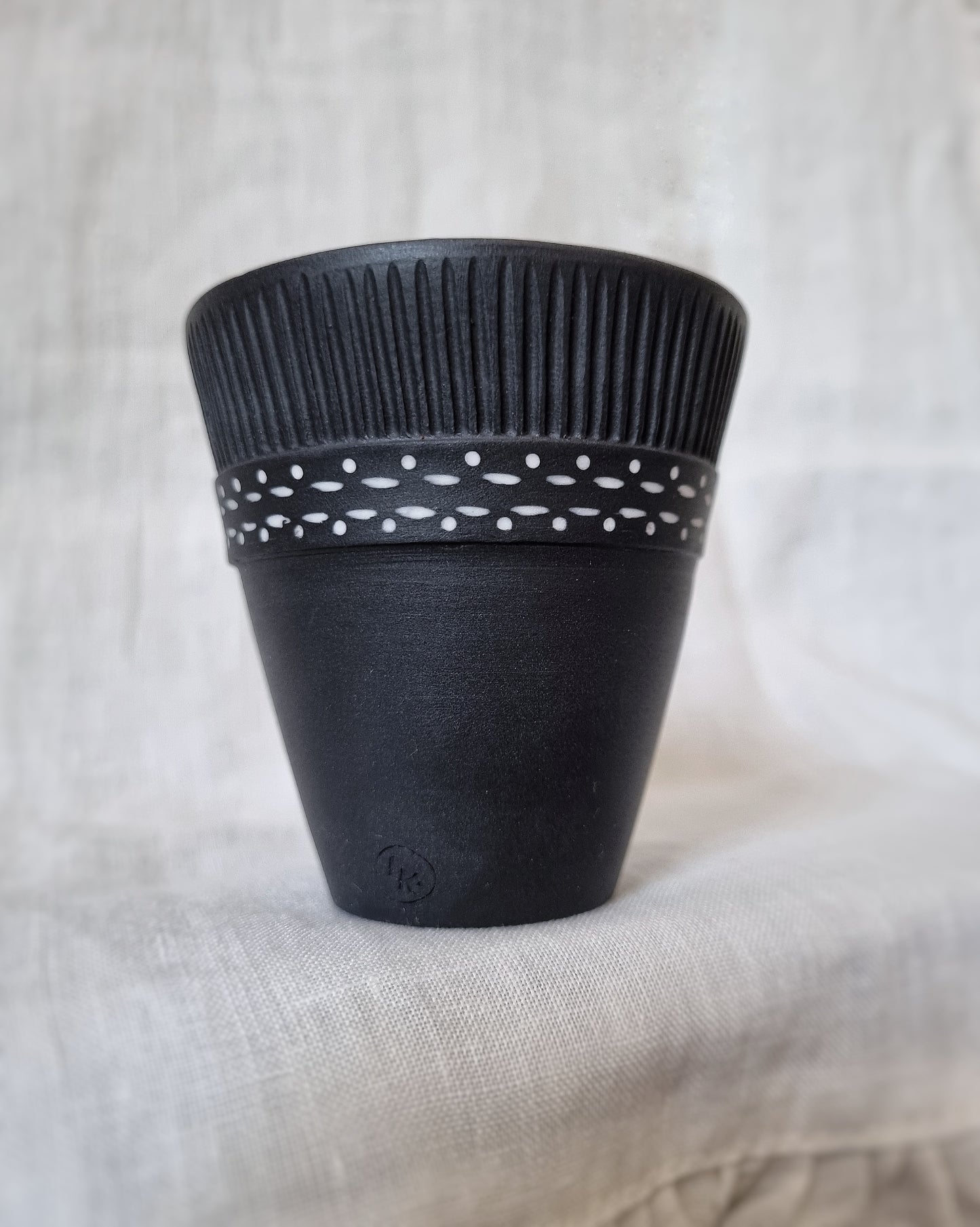 Verre porcelaine noire motifs blancs