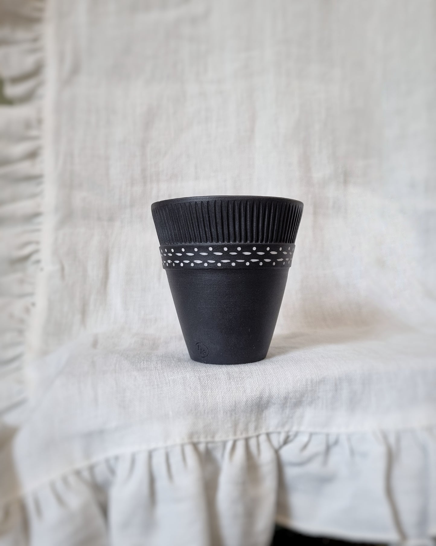 Verre porcelaine noire motifs blancs