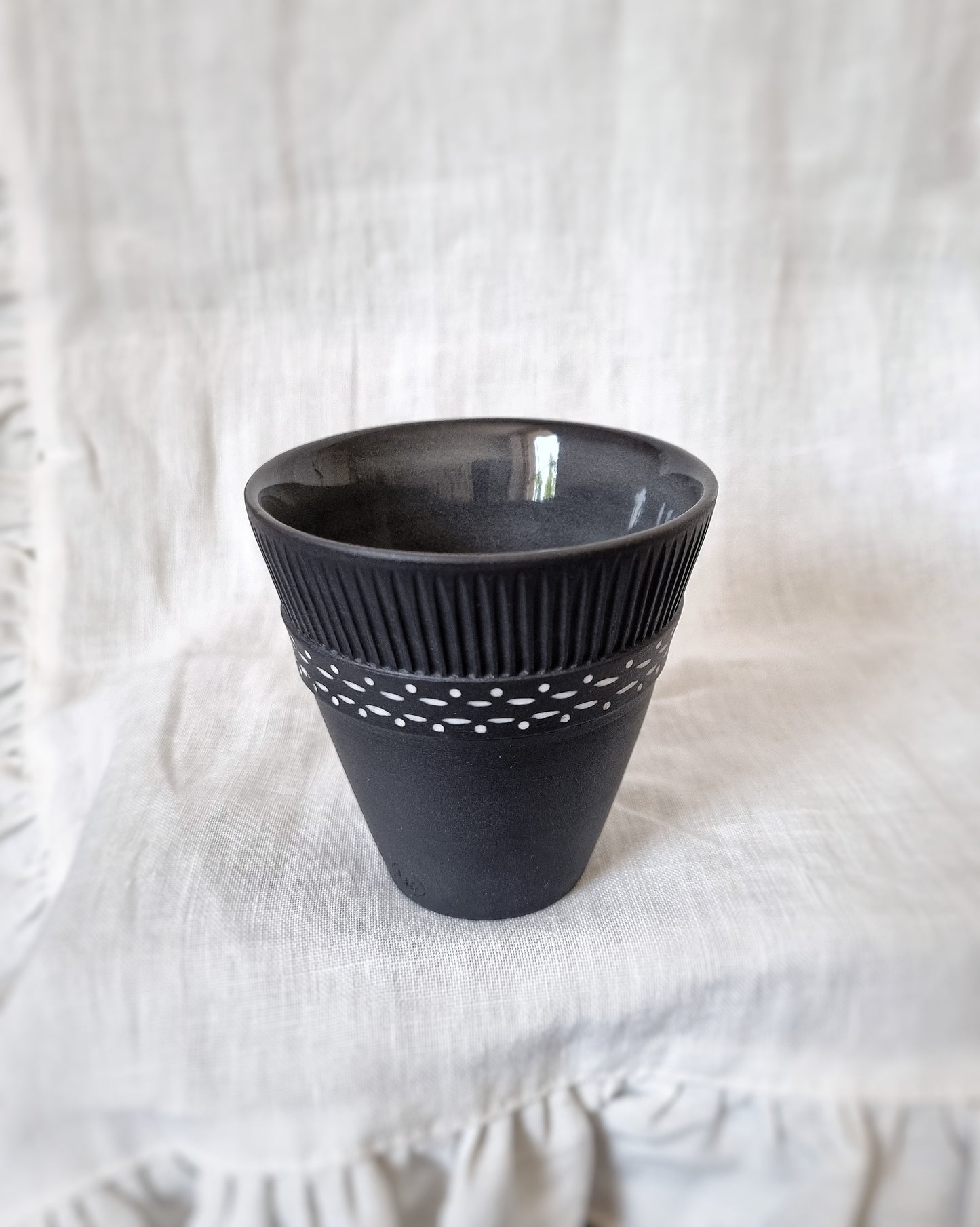 Verre porcelaine noire motifs blancs